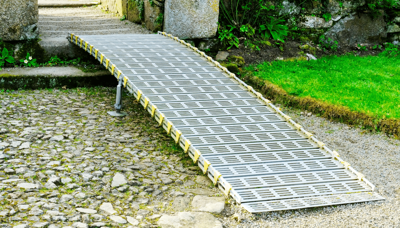 Temporary wheelchair ramp sitting on driveway